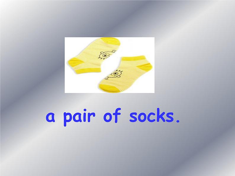 外研版(一年级起点)小学一年级英语下册 Module 8 Unit 1 There is a pair of shorts under that duck. 课件06