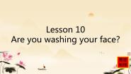 小学英语科普版四年级下册Lesson 10 Are you washing your face?图片课件ppt