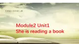 外研版（三起）四年级上M2U1She is reading a book 课件