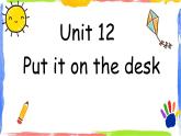 广州教科版三上英语课件 Unit 12 Put it on the desk.