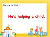 外研版（一起）英语二年级下册课件 Module 10《Unit 2 he's helping a child》