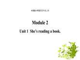 Module 2 unit 1 She's reading a book课件PPT