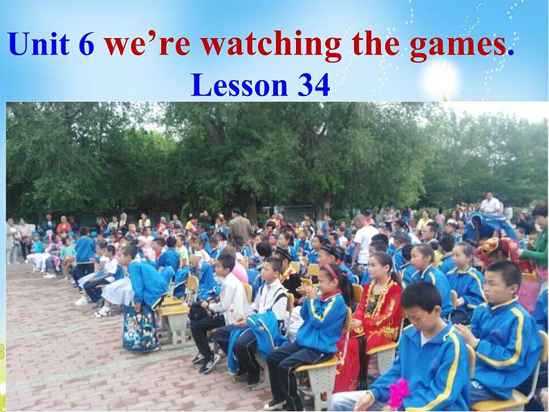 人教精通版小学英语五下 Unit6 We are watching the games.(Lesson34) 课件第1页