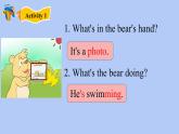 小學(xué)英語外研版2B Unit1 She's listening to the radio 部優(yōu)課件