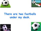 外研版（一年级起点）小学一年级英语下册 Module 8  Unit 2 There are two footballs under my desk.  课件1
