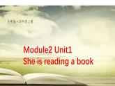 外研版（三起）四年級上M2U1She is reading a book 課件